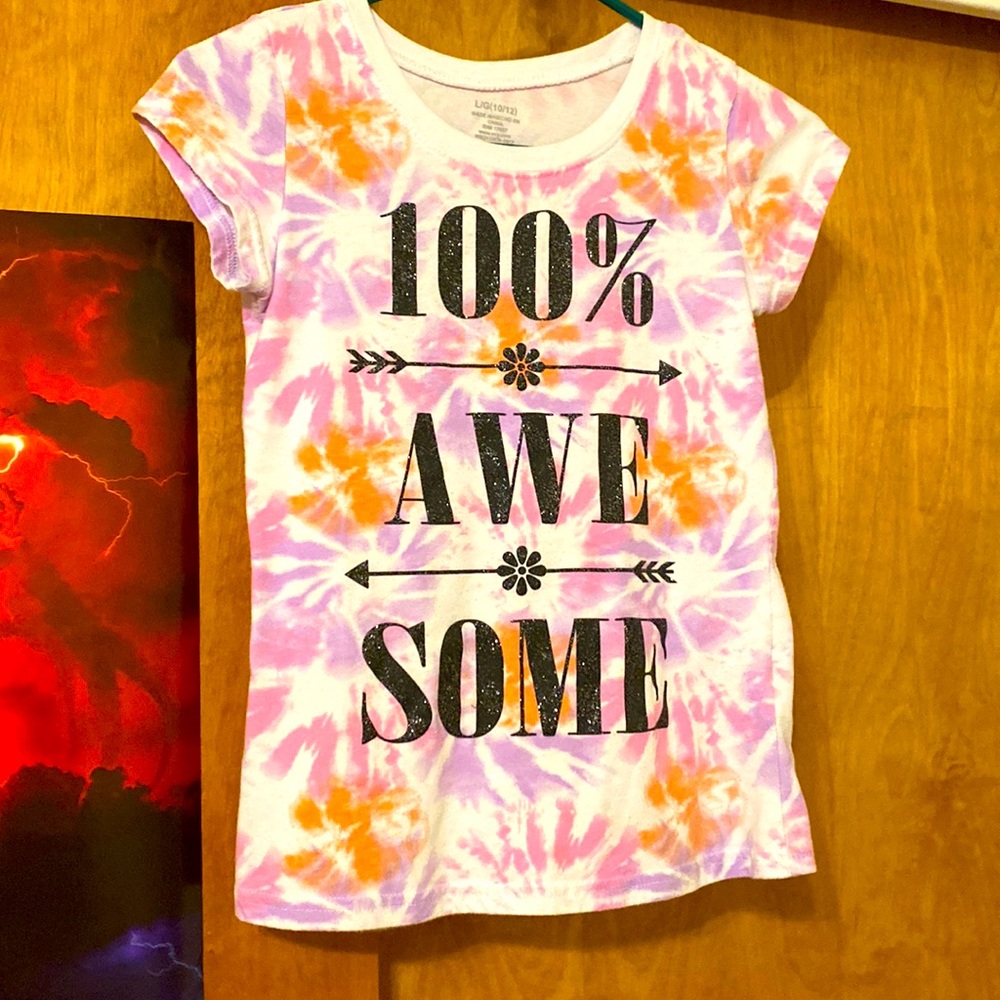 Tie-dye t-shirt. “100% awesome” 10/12 large. No stains. For girls/kids/teens.